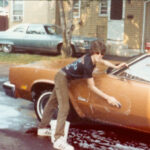 Ken washing his 1977 Oldsmobile Cutlass