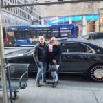 Ken and Lisa in NYC after getting a ride by The Plaza's Maybach
