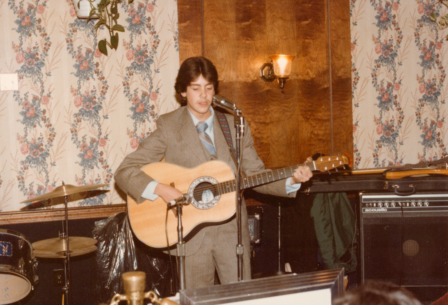 Ken playing guitar in 1982