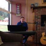 Ken playing piano at Nova's Bakery in Rock Hill, SC